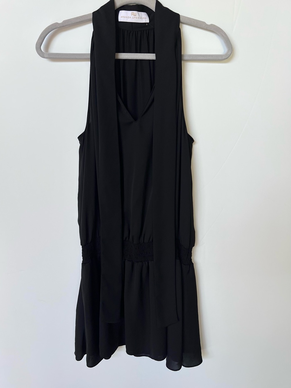 This Amanda Uprichard Sleeveless Neck Tie with Smocked Drop Mini Dress